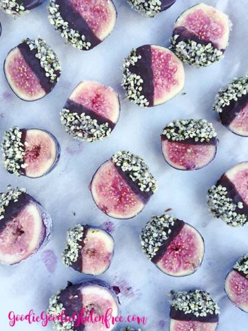 Gluten-Free, Vegan and Paleo chocolate covered figs dipped in hemp seeds with coconut oil. It's the perfect treat!