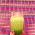 festive cucumber apple green juice in a mason jar