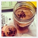 a decadent homemade chocolate smoothie in a tall mason jar