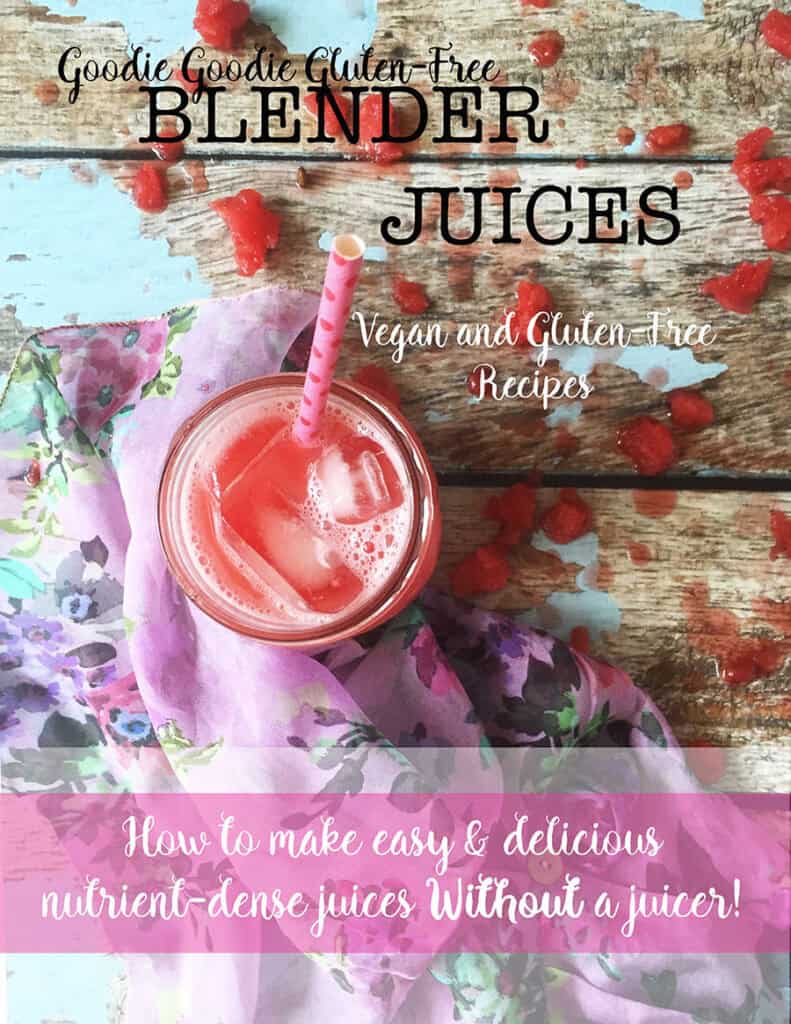 overhead view of a mason jar of watermelon juice with a pink straw on a lavender floral napkin sitting on a wooden table.